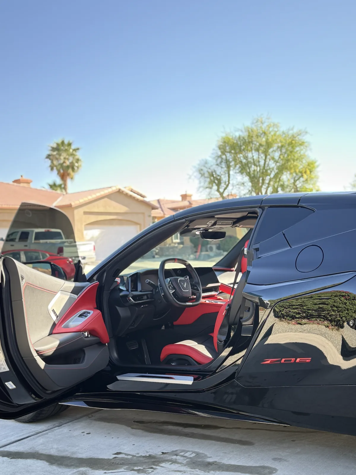 Detailed red-and-black cabin of a Chevrolet Corvette Z06