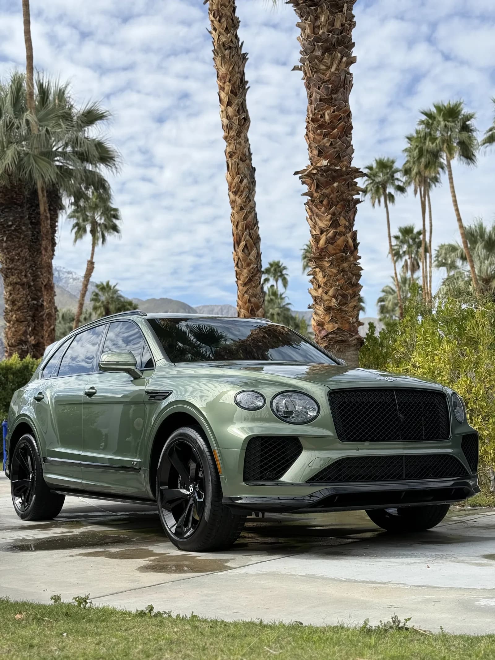 Green Bentley Bentayga after mobile exterior detailing