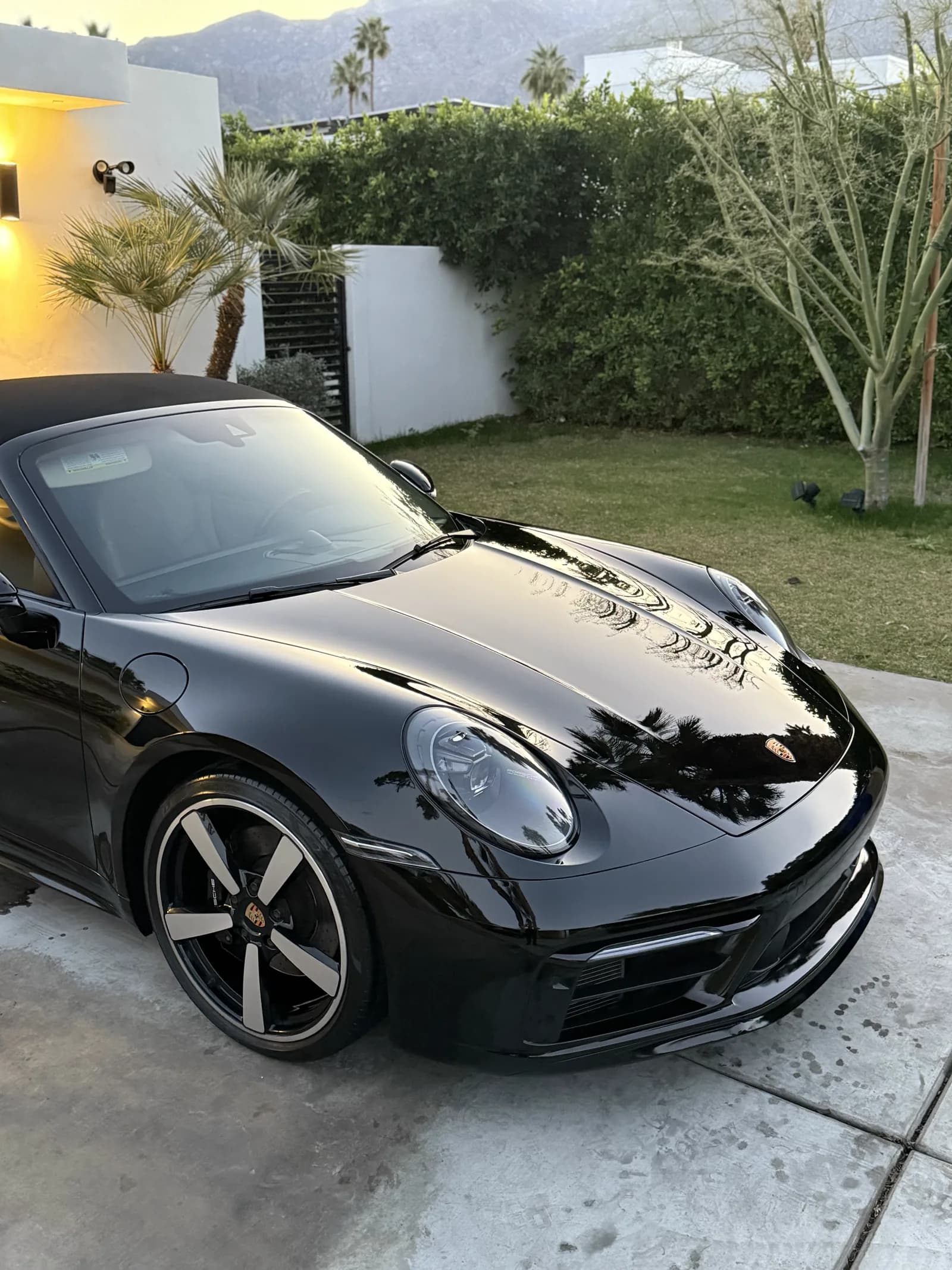 Black Porsche 911 after professional detailing