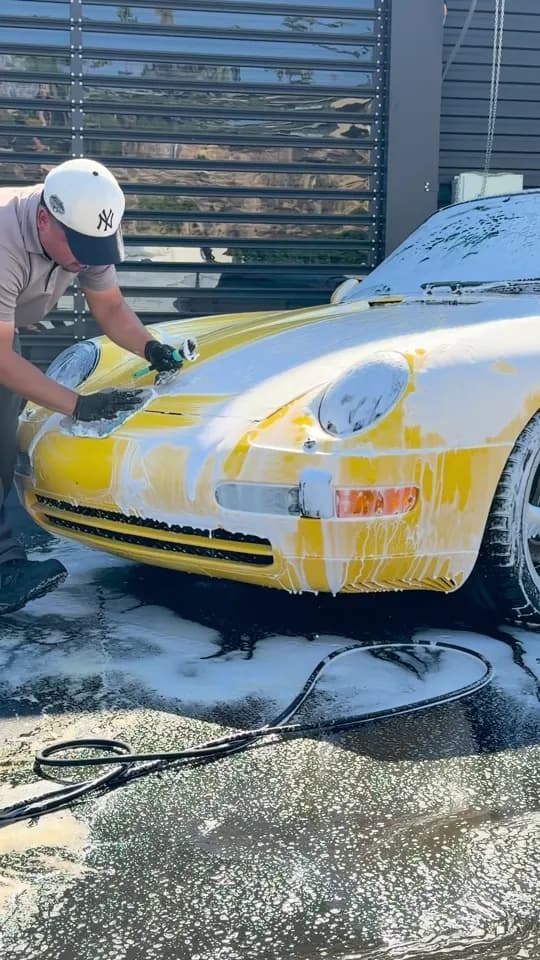 Yellow Porsche receiving a full detail in Palm Springs