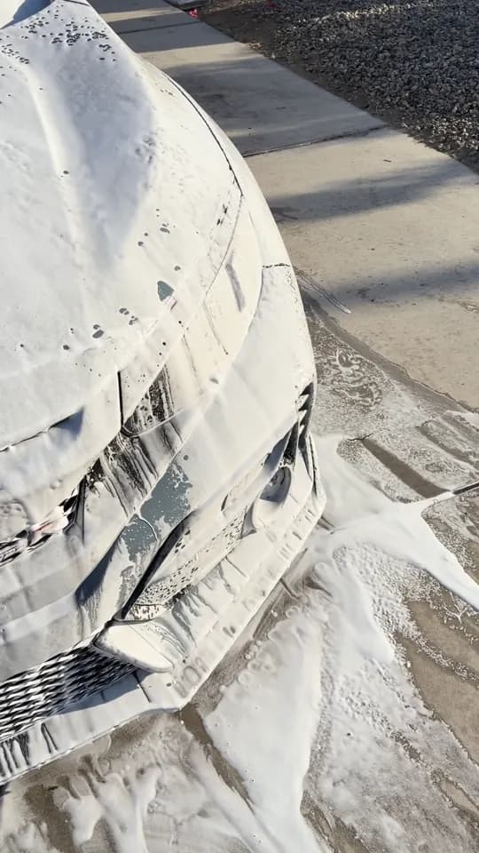 Honda Civic Type R covered in foam during an exterior detail